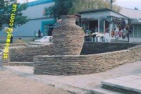 облицовка забора камнем