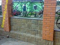 забор облицованный плиткой из камня