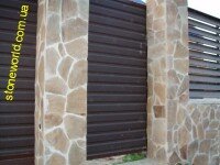 облицовка забора камнем